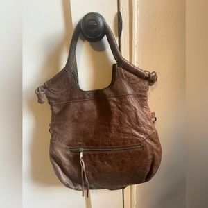 Medium size bag. Have so much life left. Selling bc I have it in black too.